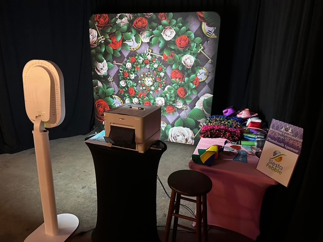 Event photo booth with floral backdrop